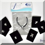 J179a. Infiniti charm bracelet with 6 extra charms. (2 Turtles, 2 dolphins, frog and rose.) - $$16 each 